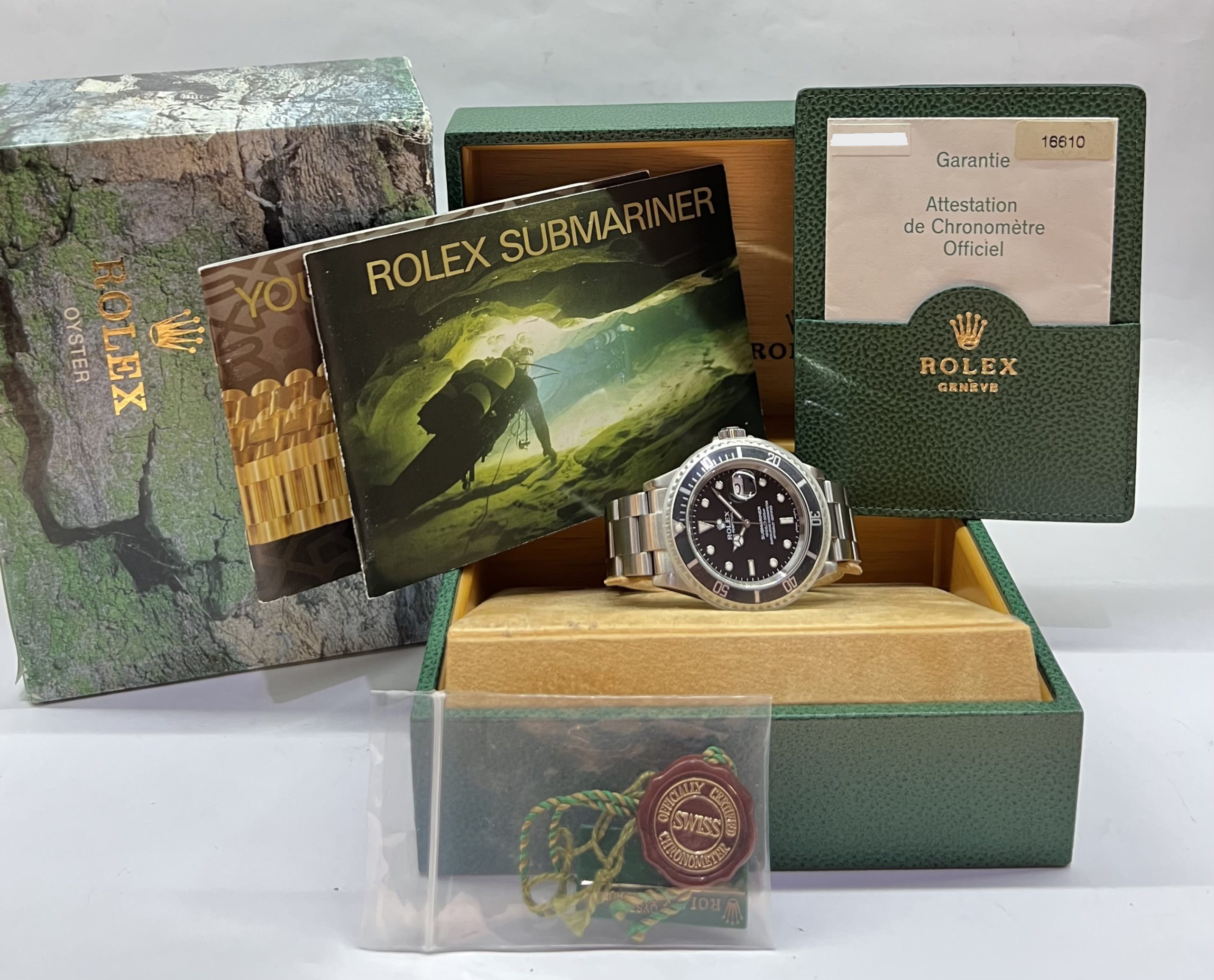 Rolex Submariner Date in Stainless Steel on Rolex Stainless steel Flip lock Oyster Bracelet, Black Index Dial, Complete with the Inner & Outer box, Rolex Warranty certificate and swing tags. Reference: 16610, Circa 2004 - Image 2