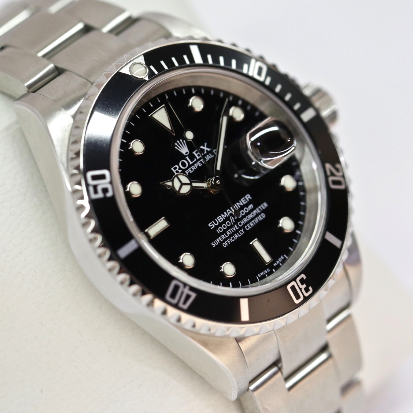 Rolex Submariner Date in Stainless Steel on Rolex Stainless steel Flip lock Oyster Bracelet, Black Index Dial, Complete with the Inner & Outer box, Rolex Warranty certificate and swing tags. Reference: 16610, Circa 2004