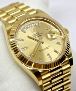 Rolex Oyster Perpetual Day-Date 40 in 18ct Yellow Gold, Champagne Dial with Factory set Baguette Diamonds, 18ct Yellow Gold Rolex President bracelet, Ref. 228238, Ca. 2020