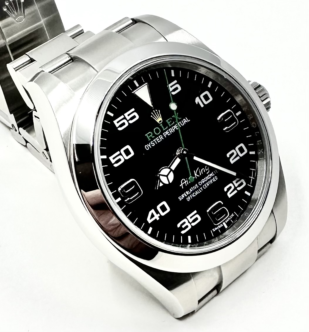 Rolex Airking in stainless steel, Black Arab 3,6, 9 - 60 minute dial, on a Rolex Oystersteel bracelet with original box.