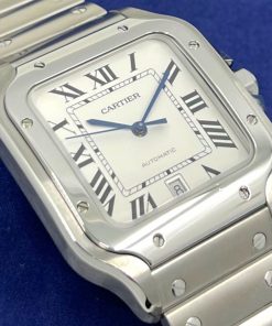 Cartier Santos de Cartier Watch, Large model, in Stainless Steel, Silver Roman Dial with Blue- Sword Shaped Hands on Stainless Steel Cartier Bracelet, Ref.WSSA0009, Circa: 2018, with Box & Warranty Card