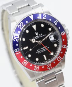 Rolex Oyster Perpetual GMT Master in Stainless steel Black Index Dial and a "Pepsi" Blue / Red Bezel, Rolex stainless steel Oyster Bracelet. Ca 1986 Watch Only.