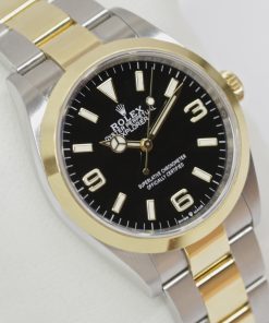 Rolex Oyster Perpetual Explorer 1, steel and 18ct yellow gold, Ref 124273, Ca 2022 full set.$15,400