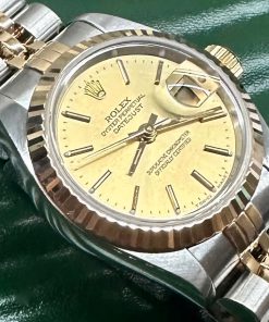 Rolex Lady Datejust 26 in Stainless Steel and 18ct Yellow Gold with Champagne index Dial on Rolex Stainless Steel and 18ct Yellow Gold Jubilee Bracelet, Ref: 69173 Circa: 1996