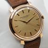 IWC wristwatch in 18ct rose gold, Flared Lugs, Rare gold textured Dial, Manual winding, Calibre 89, 37mm case on brown suede strap