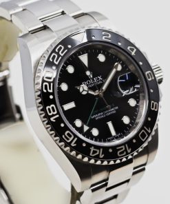Rolex Oyster Perpetual GMT Master II in Rolex Oystersteel,  Black index dial and Cerachrom black bezel on a Rolex Oystersteel bracelet, Ref 116710LN, Box, book and Rolex Warranty card, Ca 2018.