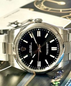 Alternative view of Rolex Oyster Perpetual 41 Ref 124300, with Bright Black dial, 2022, box and papers.