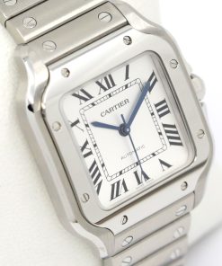 Cartier Santos De Cartier Watch, Medium Model, in Stainless Steel, Opaline Roman Dial, Blue Sword-Shaped Hands, on Cartier Stainless Steel Bracelet, Ref. WSSA0029, Circa: 2022, Complete with Box, Books & Cartier Warranty Card