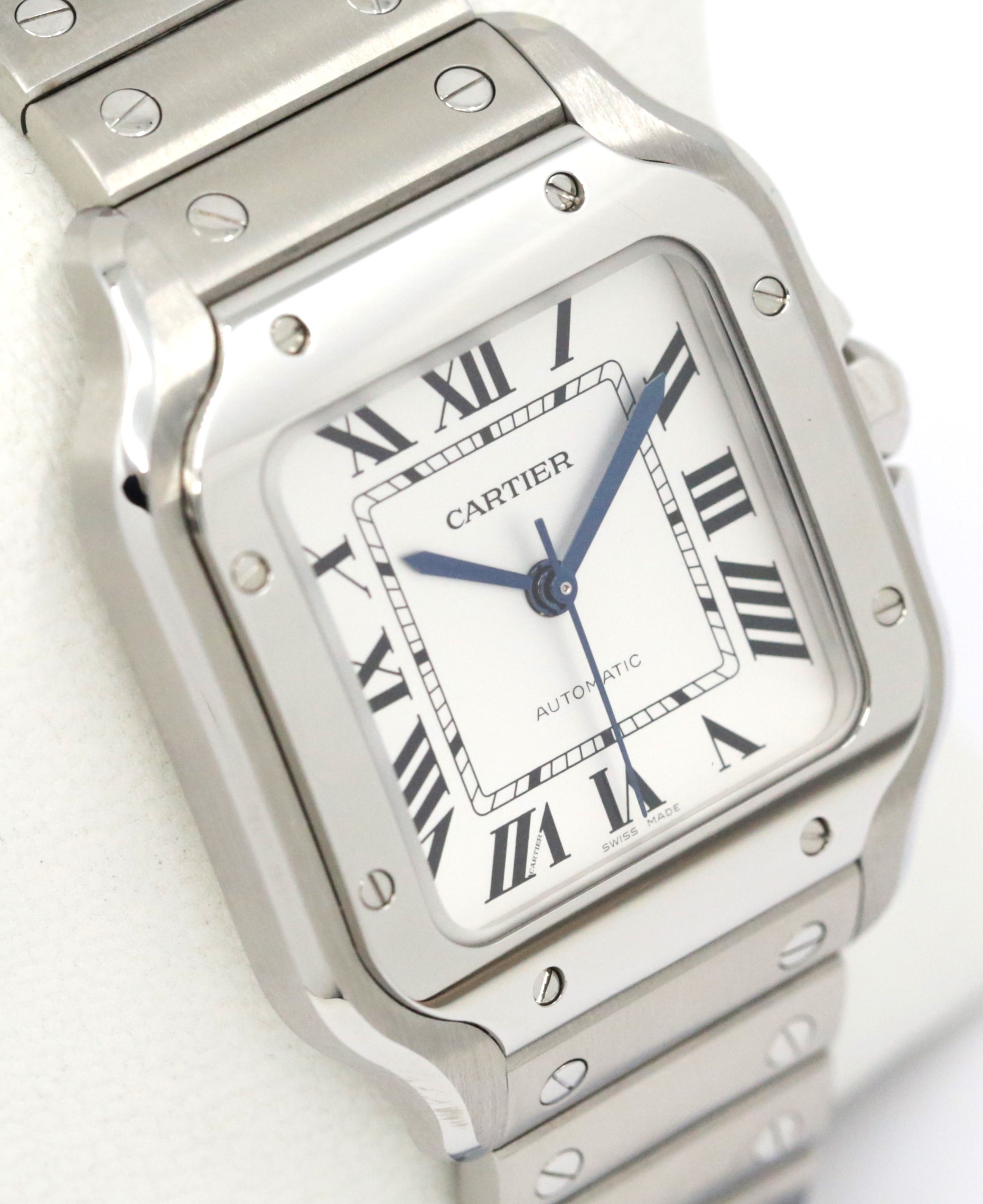 Cartier Santos De Cartier Watch, Medium Model, in Stainless Steel, Opaline Roman Dial, Blue Sword-Shaped Hands, on Cartier Stainless Steel Bracelet, Ref. WSSA0029, Circa: 2022, Complete with Box, Books & Cartier Warranty Card