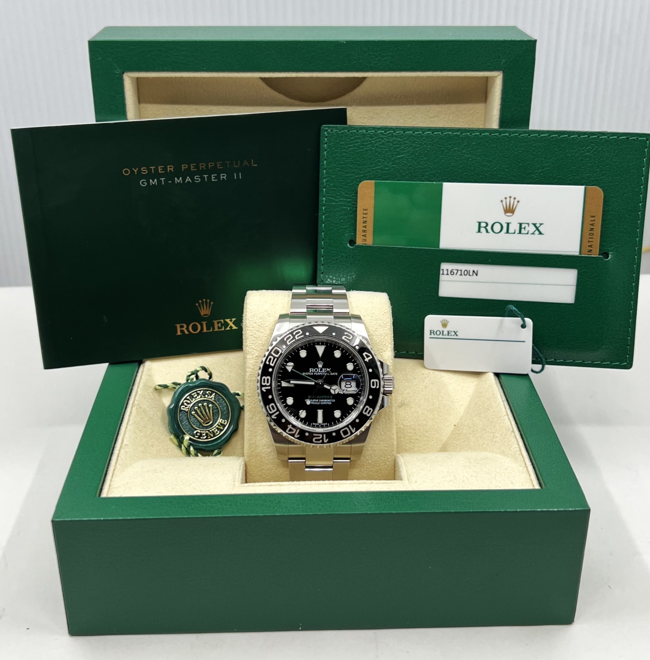 Rolex Oyster Perpetual GMT Master II in Rolex Oystersteel, Black index dial and Cerachrom black bezel on a Rolex Oystersteel bracelet, Ref 116710LN, Box, book and Rolex Warranty card, Ca 2018. - Image 8