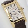 Cartier Tank American, Midsize in  18ct yellow gold, Quartz movement, Cartier strap with 18ct Yellow gold Cartier folding buckle.