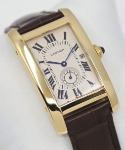 Cartier Tank American, Midsize in  18ct yellow gold, Quartz movement, Cartier strap with 18ct Yellow gold Cartier folding buckle.