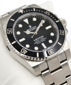 Rolex Oyster Perpetual Submariner, Case reference 114060, sold new 2018, box and warranty card, still has plastic protection.