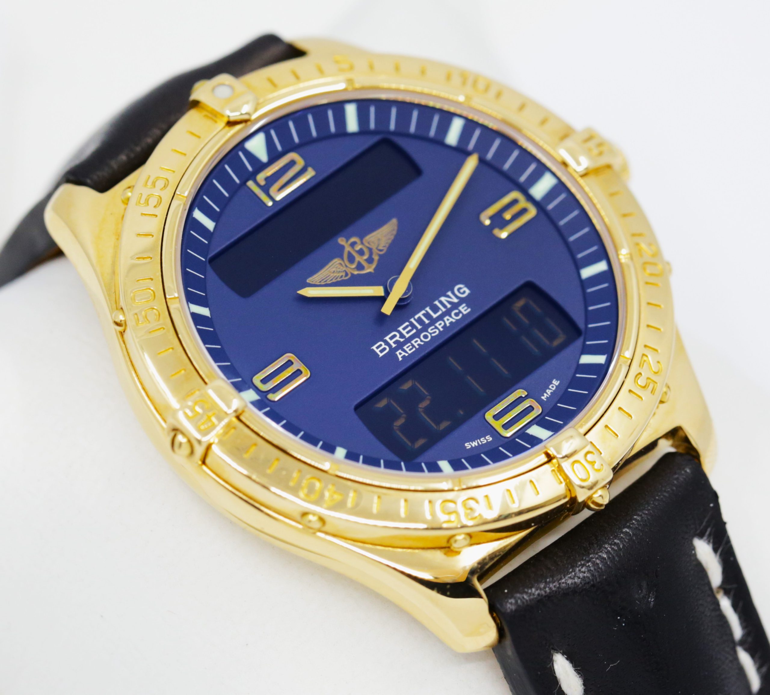 Breitling Aerospace in 18ct Yellow Gold, Navy Blue 12, 3, 6, 9 Dial, on Black Breitling Leather Strap with 18ct Yellow Gold Breitling Tang Buckle, Ref. K56062