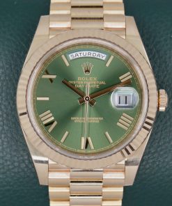 Rolex Day-Date 40, in 18ct Everose Gold, Olive Green Roman Dial, on 18ct Everose Gold Rolex President Bracelet, Ref. 228235, Circa: 2017, with Box, Books & Rolex Warranty Card