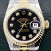 Rolex Lady Datejust 26, Stainless Steel & 18ct Yellow Gold, Black Factory Set Diamond Dial on Stainless Steel & 18ct Yellow Gold Rolex Jubilee Bracelet, Ref. 179713, Circa: 2007, with Box, Books, Rolex Warranty Certificate & Rolex Service Card Dated July 2017