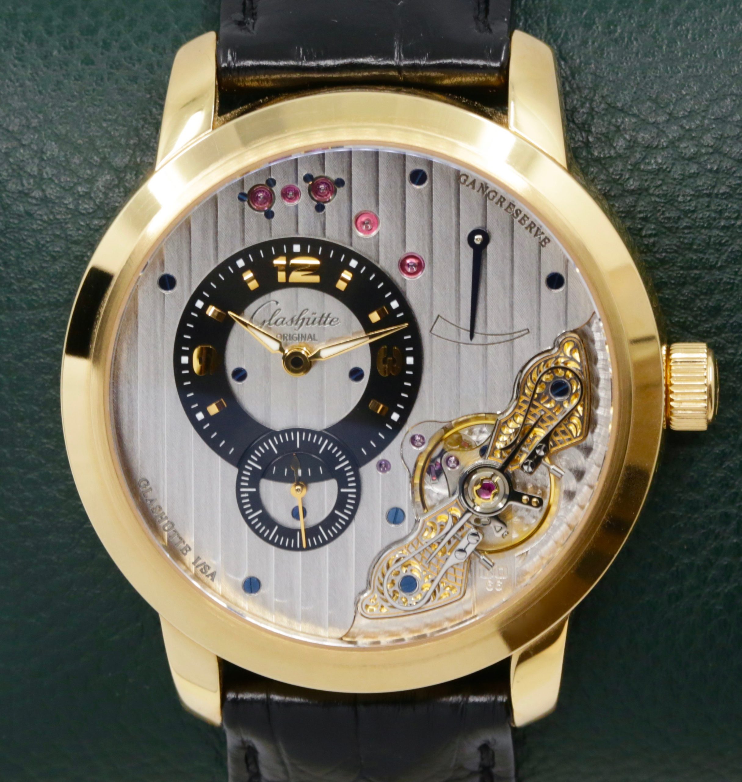 Glashutte Original PanoInverse XL, in 18ct Yellow Gold, Black Arab Dial with sub dials at 6, black Glashutte Original crocodile strap with 18ct Yellow Gold Glashutte Original Deployant, Ref. 661010105, Circa: 2013, Complete Box & Book,