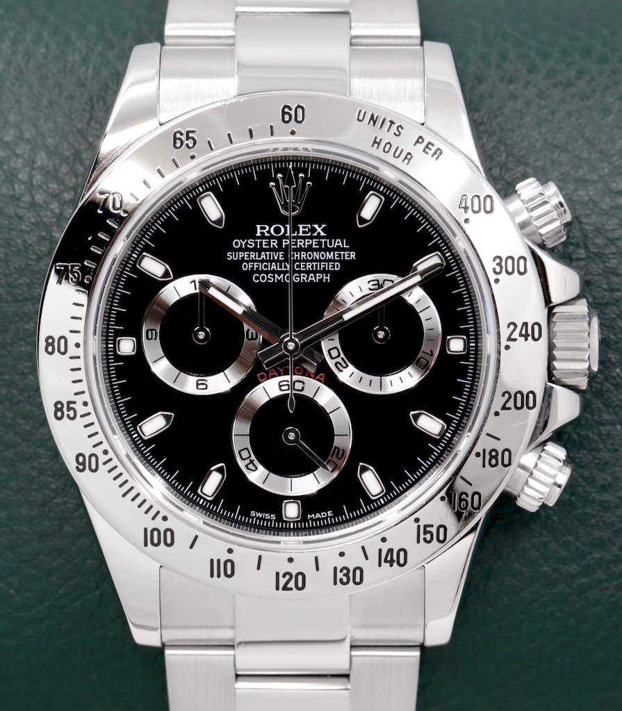 Rolex Cosmograph Daytona, in Stainless Steel, Black Index Dial, Stainless Steel Bezel, on Stainless Steel Rolex Oyster Bracelet, Ref. 116520, Circa: 2014, Complete with Box, Books, Rolex Warranty Card & Rolex Service Card Dated October 2023