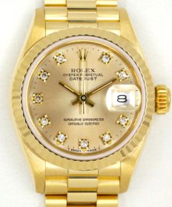 Rolex Lady Datejust 26 in 18ct Yellow Gold, Factory Set Champagne Diamond Dial on 18ct Yellow Gold Rolex President Bracelet, Ref. 69178, Circa: 1989, with Box, Books, Rolex Certificate & Rolex Service Receipt