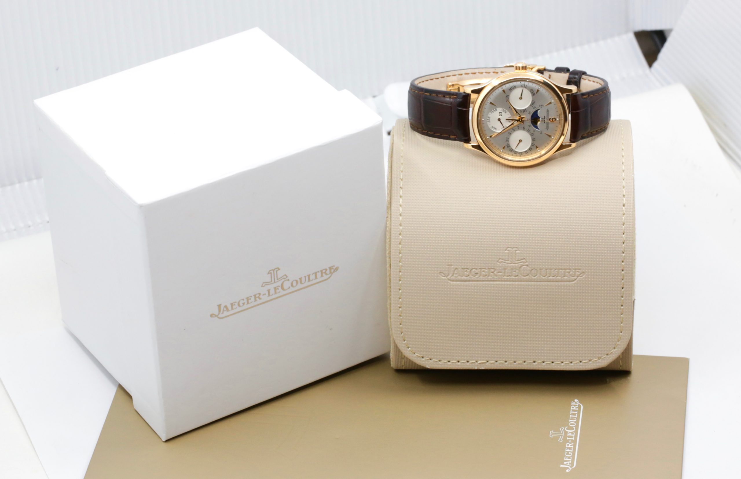 Jaeger LeCoultre Master Ultra Thin Perpetual Calendar Automatic in 18ct Rose gold, silver index dial with subdials for day date, month, phases of the moon ,Year indicator on a JLC Alligator Strap and JLC Rose gold Deployant Clasp, with JLC Service Box & JLC Service Papers - Image 8