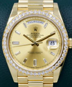 Rolex Oyster Perpetual Day-Date 40 in 18ct Yellow Gold, Factory Set Champagne Baguette Dial with Factory Set Diamond Bezel on 18ct Yellow Gold President Bracelet, Ref. 228348RBR, Circa: 2016, with Box, Book, Rolex Warranty Card & Balance of 2 Year Rolex Service Warranty