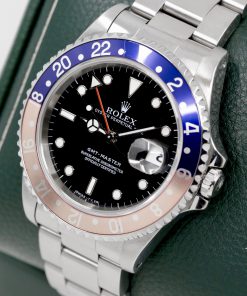 Alternative view of Rolex Oyster Perpetual GMT-Master, Reference 16700, Black "Swiss - T < 25" Dial, Faded Blue & Red Bezel, on Stainless Steel Rolex Oyster Bracelet, Circa: 1997, with Original Rolex Box