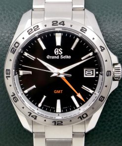 Grand Seiko 9F Quartz GMT in Stainless Steel, Black Index dial on a Grand Seiko stainless steel bracelet. Ref: SBGN003G,  Box, Book and Grand Seiko Warraty card. Ca. 2022