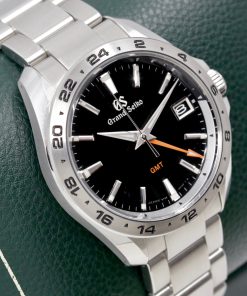 Alternative view of Grand Seiko 9F Quartz GMT in Stainless Steel, Black Index dial on a Grand Seiko stainless steel bracelet. Ref: SBGN003G,  Box, Book and Grand Seiko Warraty card. Ca. 2022