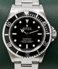 Rolex Oyster Perpetual Submariner Non-Date "4 Liner", in Stainless Steel, Black Index Dial, on Stainless Steel Rolex Oyster Bracelet, Ref.14060M, Circa: 2009, with Box, Book & Rolex Warranty Card