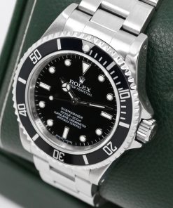 Alternative view of Rolex Oyster Perpetual Submariner Non-Date "4 Liner", in Stainless Steel, Black Index Dial, on Stainless Steel Rolex Oyster Bracelet, Ref.14060M, Circa: 2009, with Box, Book & Rolex Warranty Card