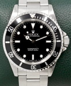Rolex Oyster Perpetual Submariner Non-Date, Stainless Steel, Black Index Dial, on Stainless Steel Rolex Oyster Bracelet, Ref. 14060, Circa: 1996, with Rolex Box and Swing Tag