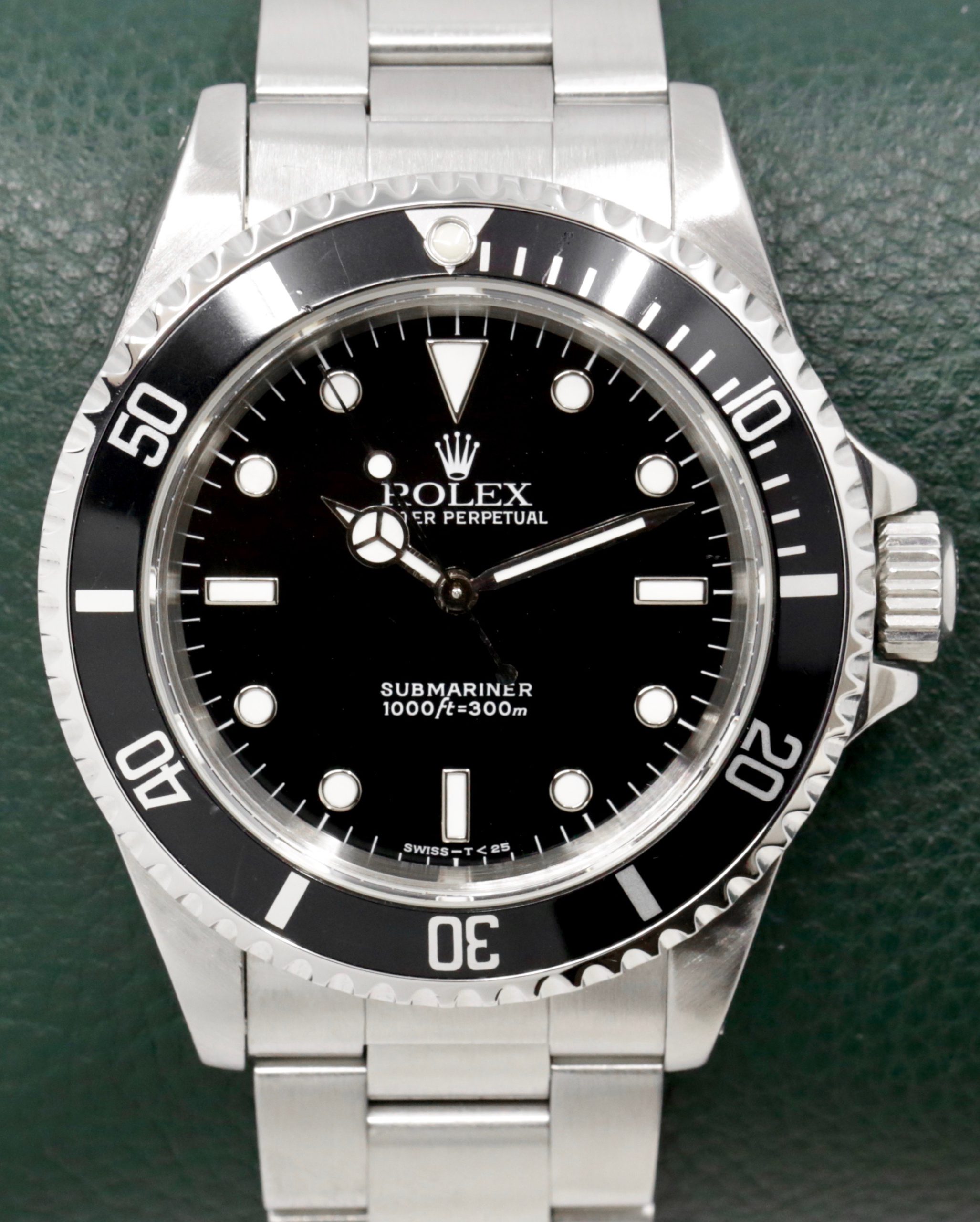 Rolex Oyster Perpetual Submariner Non-Date, Stainless Steel, Black Index Dial, on Stainless Steel Rolex Oyster Bracelet, Ref. 14060, Circa: 1996, with Rolex Box and Swing Tag