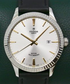 Tudor Style 41 in stainless steel, silver index dial with fluted bezel on a black Tudor leather band with a stainless steel deployant. Ref: 12710.  Complete with Box books and Tudor Warranty card Ca. 2023