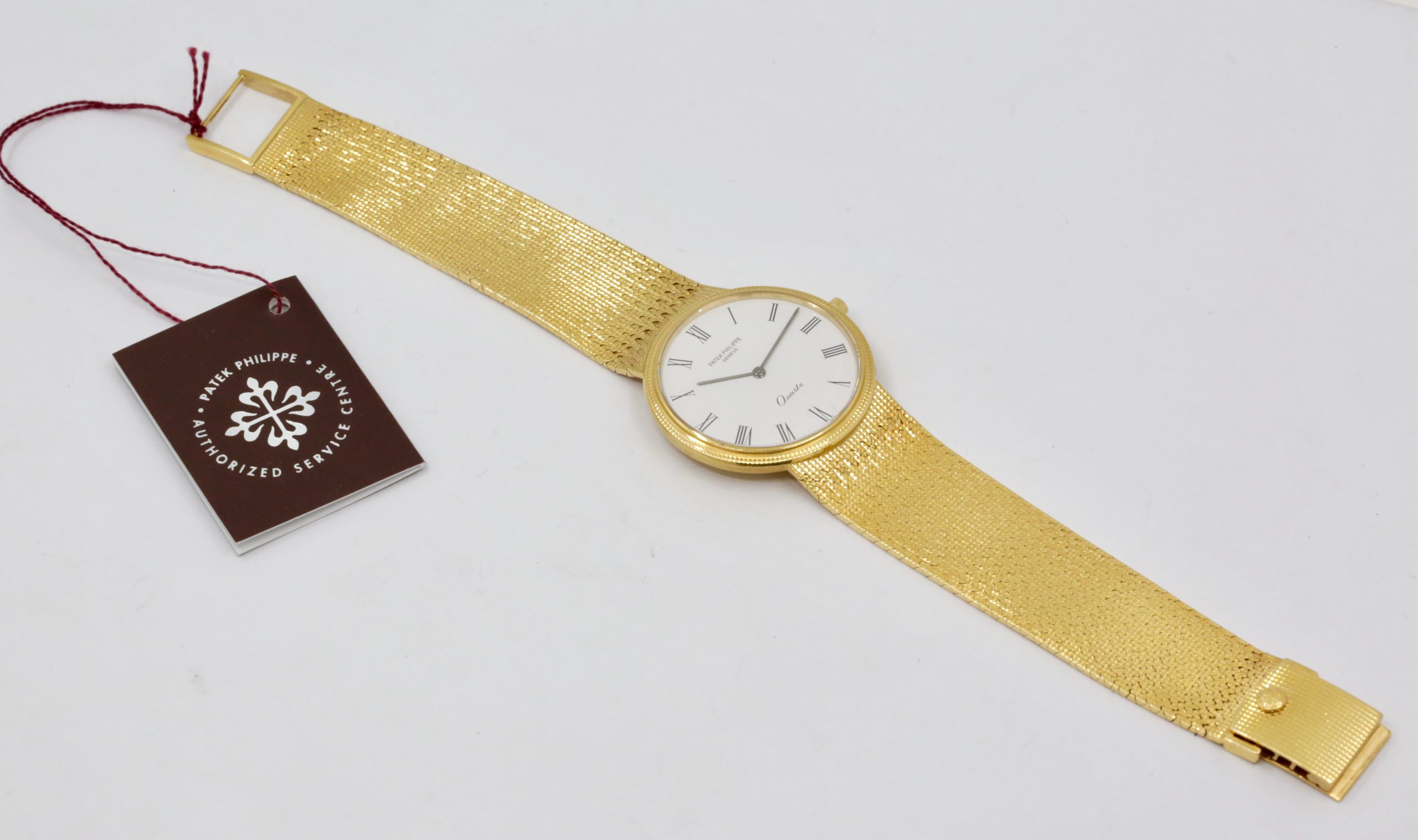 Patek Philippe Ref 3744/001 Calatrava hobnail bezel gents quartz 18K 0.750 yellow gold on original PP bracelet. - Image 6