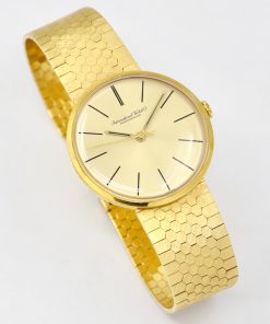 IWC Schaffhausen classic dress watch in 18ct yellow gold manual wind wristwatch, Champagne index dial with a 18ct Yellow gold integrated bracelet. Ref 1410, Ca. 1970's - $11,800 incl. GST!!