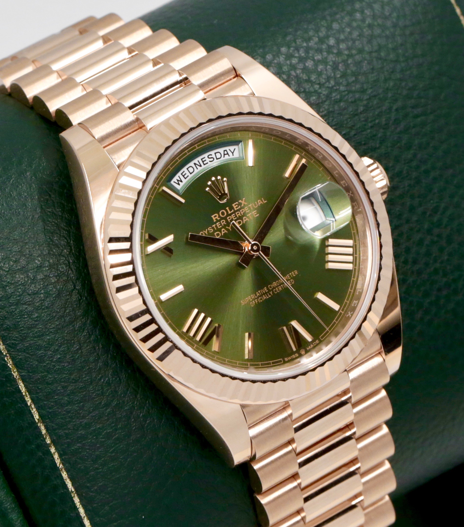 Rolex Day-Date 40, 18ct Everose Gold, Olive Roman Dial, on 18ct Everose Gold Rolex President Bracelet, Ref. 228235, Circa: 2023, with Box, Books, Swing Tag, Rolex Warranty Card & Balance of 5 Year Rolex Factory Warranty