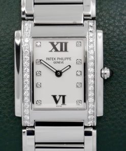 Patek Philippe Twenty ~ 4, Stainless Steel, Factory Set Diamond Bezel, with Factory Set Diamond Silver Dial, on Stainless Steel Patek Philippe Bracelet, Ref. 4910/10A-011, Circa: 2009, with Box, Books & Patek Philippe Certificate