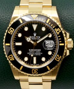 Rolex Oyster Perpetual Submariner Date, 41mm, in 18ct Yellow Gold, Black Ceramic Bezel, Black Index Dial, on 18ct Yellow Gold Rolex Oyster Bracelet, Ref. 126618LN, Circa: 2021, Complete with Box, Books, Rolex Warranty Card & Balance of 5 Year Rolex Warranty