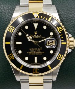 Rolex Oyster Perpetual Submariner Date, in Stainless Steel & 18ct Yellow Gold, Black Index Dial, on Stainless Steel & 18ct Yellow Gold Rolex Oyster Bracelet, Ref. 16613, Circa: 2007, with Box, Swing Tag, Rolex Service Cards, & Rolex Warranty Certificate