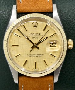Rolex Oyster Perpetual Date, S/Steel & Yellow Gold,  Champagne Linen Index Dial, on a Molequin strap,  Ref. 15000, Circa: 1982,  Watch Only,
