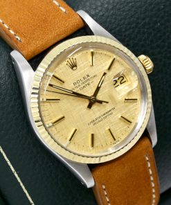 Alternative view of Rolex Oyster Perpetual Date, S/Steel & Yellow Gold,  Champagne Linen Index Dial, on a Molequin strap,  Ref. 15000, Circa: 1982,  Watch Only,