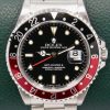 Rolex GMT-Master II "Coke", Stainless Steel, Black Index Dial, Black & Red Bezel, on Stainless Steel Rolex Oyster Bracelet, Ref. 16710, Circa: 1993, Complete with Box, Books, Rolex Warranty Certificate, Rolex Service Card & Balance of 2 Year Rolex Service Warranty