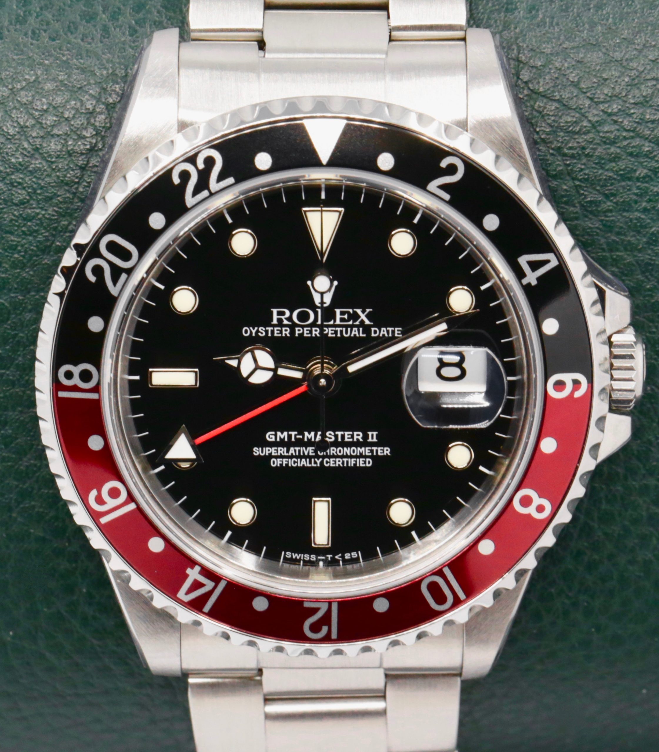 Rolex GMT-Master II "Coke", Stainless Steel, Black Index Dial, Black & Red Bezel, on Stainless Steel Rolex Oyster Bracelet, Ref. 16710, Circa: 1993, Complete with Box, Books, Rolex Warranty Certificate, Rolex Service Card & Balance of 2 Year Rolex Service Warranty