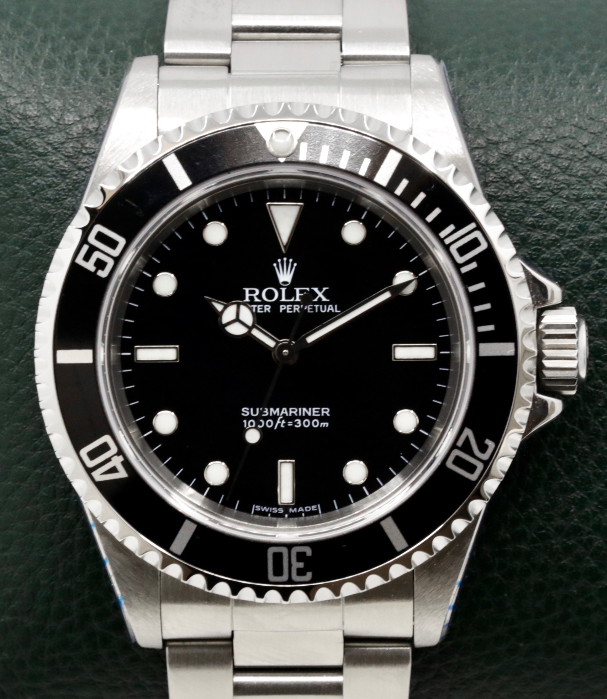 Rolex Submariner Non-Date "Two-Liner", Stainless Steel, Black Index Dial, on Stainless Steel Rolex Oyster Bracelet, Ref. 14060M, Circa: 2003, with Rolex Box, Rolex Service Card & Balance of 2 Year Rolex Service Warranty