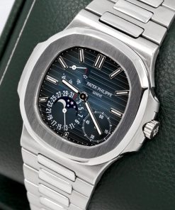 Alternative view of Patek Philippe Nautilus, Stainless Steel, with Date, Moon Phase & Power Reserve Display, on Stainless Steel Patek Philippe Bracelet, Ref. 5712/1A-001, Circa: 2011, with Box, Books, & Patek Philippe Certificate of Origin