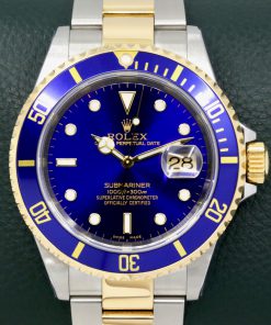 Rolex Submariner Date, Stainless Steel & 18ct Yellow Gold, Blue Aluminum Bezel, Blue Index Dial, on Stainless Steel Rolex Oyster Bracelet, Ref. 16613, Circa: 2000, with Rolex Box, Rolex Service Card, & Balance of 2 Year Rolex Service Warranty
