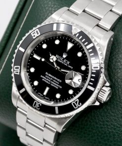 Alternative view of Rolex Submariner Date, Stainless Steel, Black Index Dial, Black Bezel, on Stainless Steel Rolex Oyster Bracelet, Ref. 16610, Circa: 2002, with Rolex Box