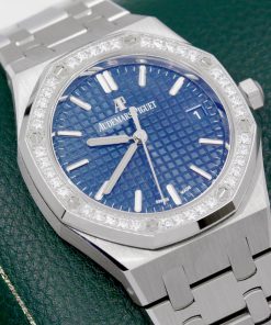 Alternative view of Audemars Piguet Royal Oak 34mm Stainless Steel with Date, Bezel set with 40 brilliant-cut diamonds ~0.71 carats on a Royal Oak Integrated Bracelet, Blue-grey Tappisserie Dial. Ref: 77351ST.ZZ.1261ST.01 Circa: 2022, Complete with Box & Papers