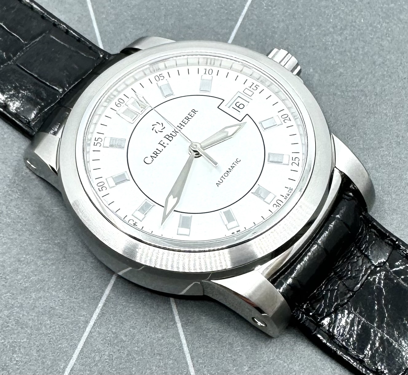 Carl F. Bucherer Patravi AutoDate, Stainless Steel, White Index Dial, on a black leather band, Ref. 10617-08A, be like Mr. Wick!!