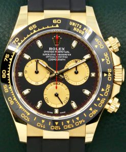 Rolex Cosmograph Daytona, in 18ct Yellow Gold, Black Ceramic Bezel, Black Index Dial with Champagne Sub-Dials, on Rolex Oysterflex Strap with 18ct Yellow Gold Rolex Deployant, Ref. 116518LN, Circa: 2023, with Box, Books, Rolex Warranty Card & Balance of 5 Year Rolex Factory Warranty